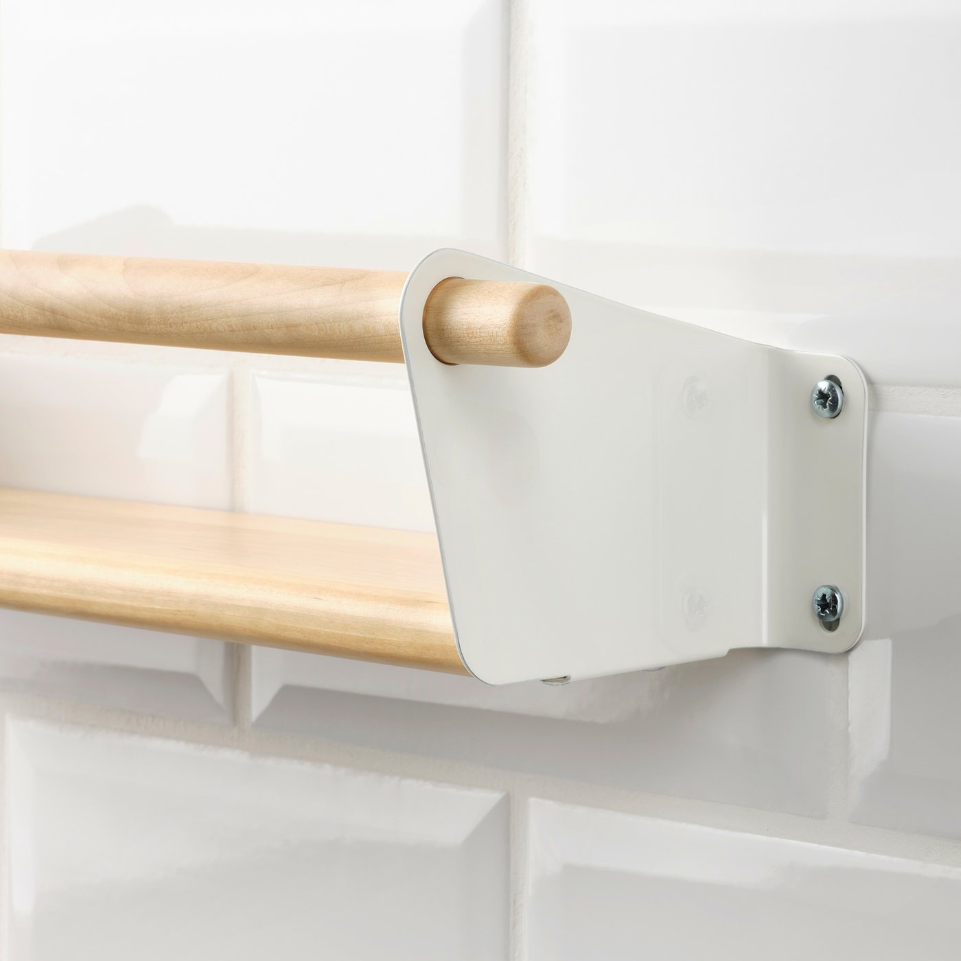 Wooden rail mounted on white bracket, securely fastened with screws, showcasing sturdy design.