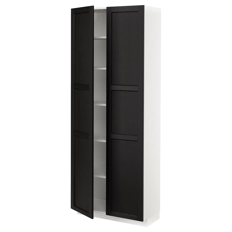 A black and white kitchen cabinet with a traditional design featuring bevelled edges on the doors.