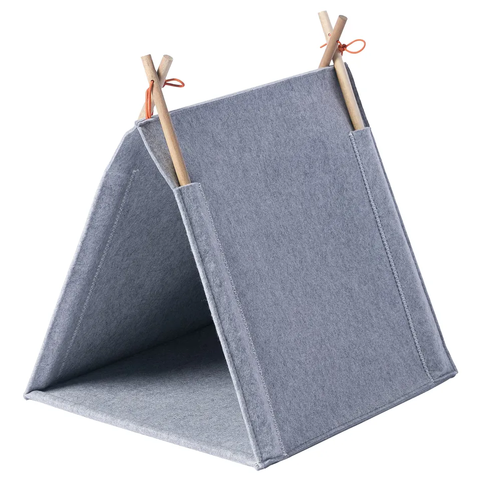 A light grey cat tent made of polyester felt, featuring a simple, triangular design with wooden poles on top.