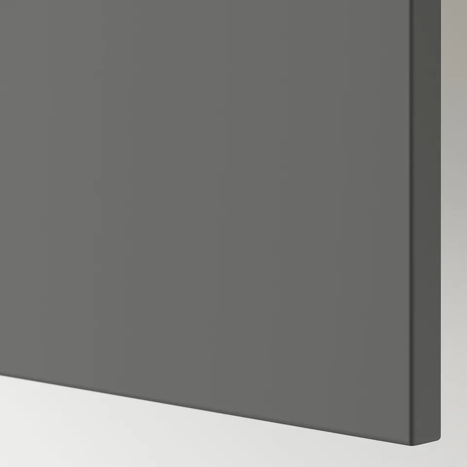 Grey flat-surface furniture panel, smooth texture, modern design.