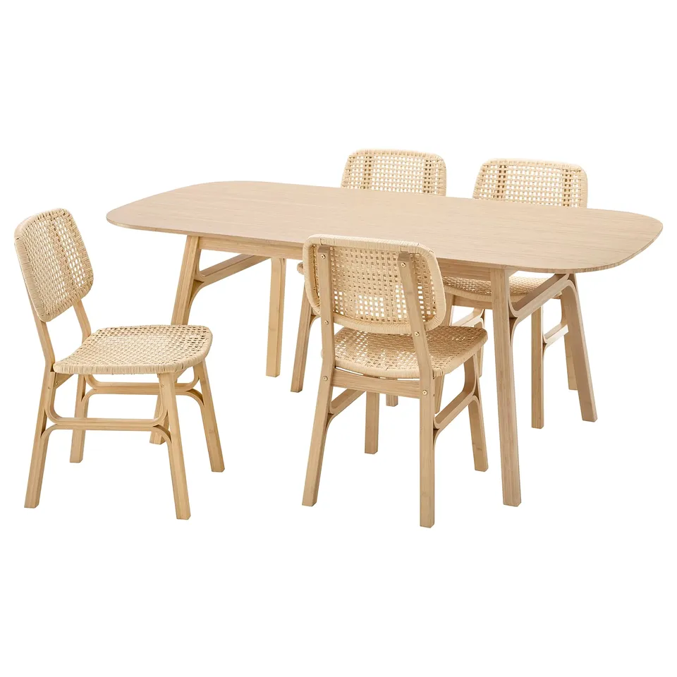 Natural bamboo dining set with woven paper twine seating, designed for comfort and rustic elegance.