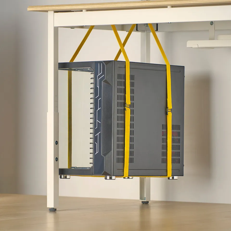 Gaming desk with tower straps: secures pc, saves space, promotes airflow.