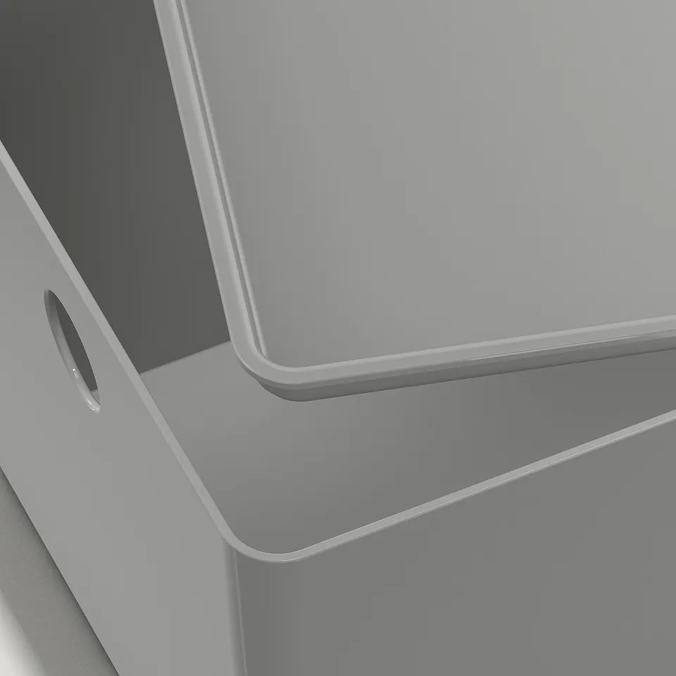Close-up of sleek, modern storage box with smooth, curved edges, crafted from durable, recycle-friendly pet plastic.