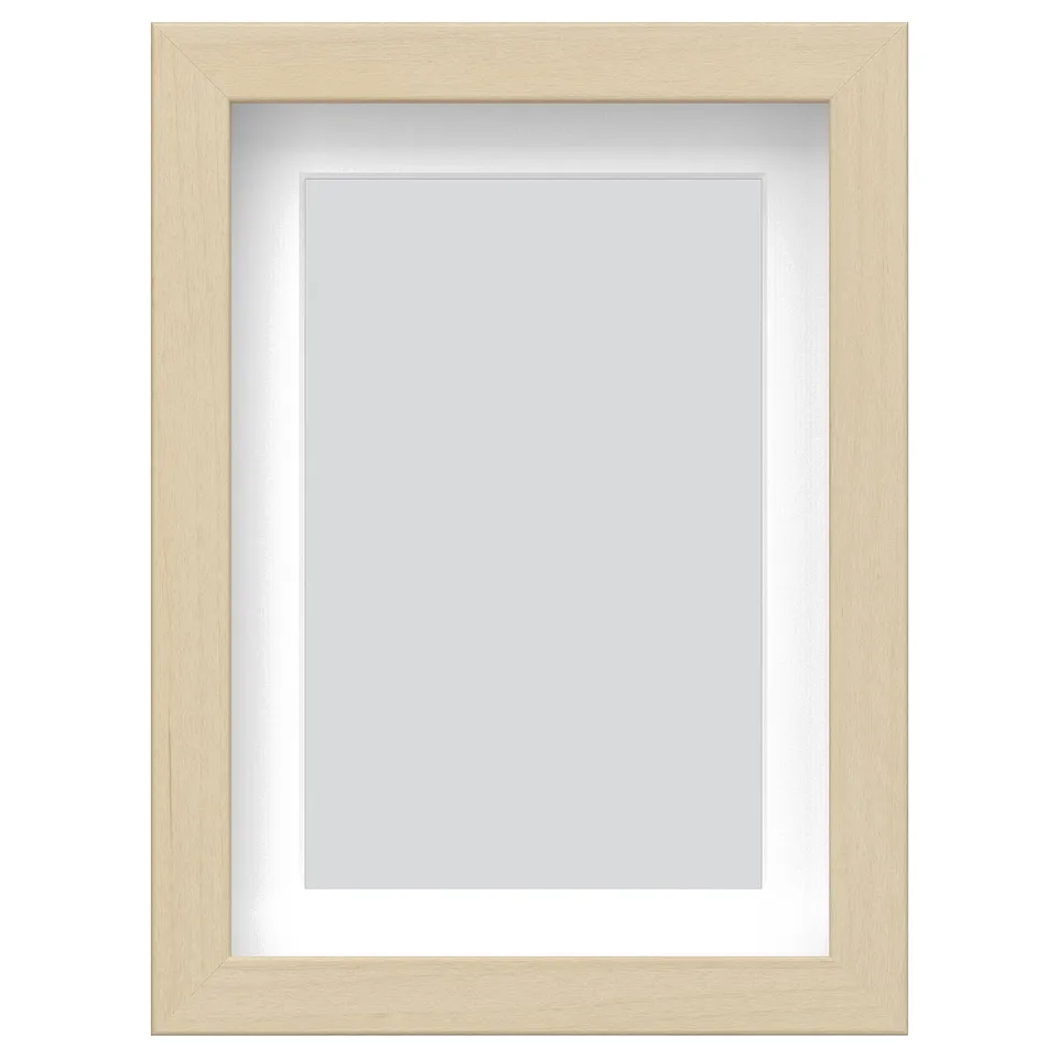 Empty light wood picture frame, rectangular, modern design.