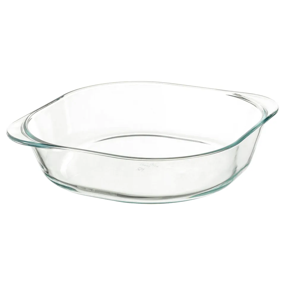 A clear, square glass baking dish. It has rounded edges and is designed for oven use.