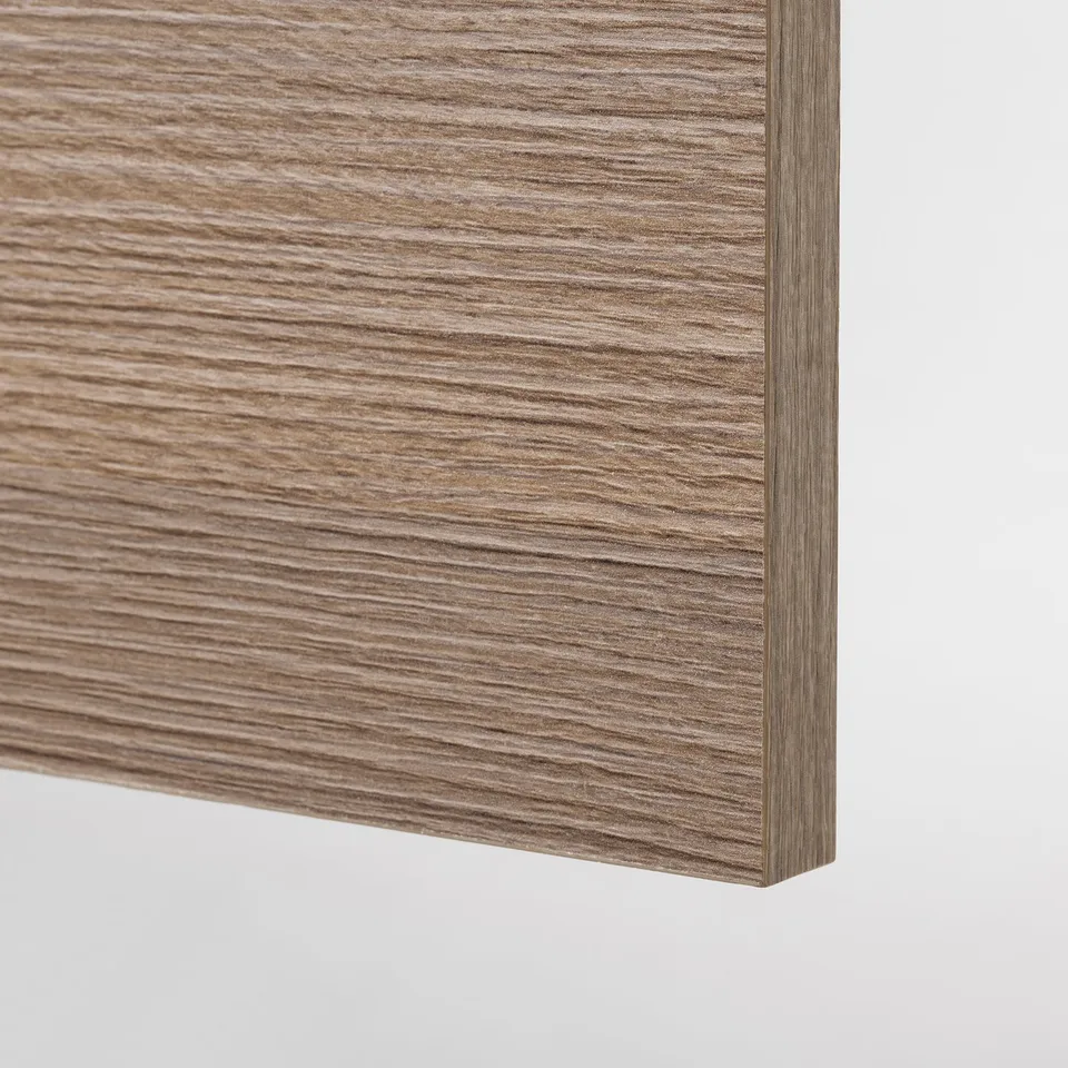 Close-up of a wooden countertop; light wood grain detail, smooth finish.
