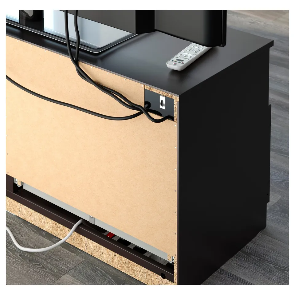 Tv bench with cable management and remote storage on top.