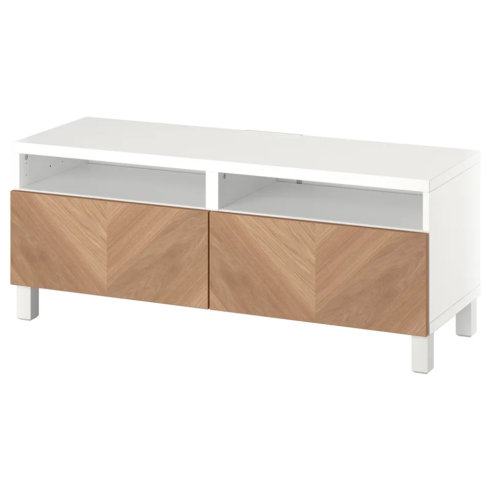 White BESTÅ tv stand with wooden doors and open shelves.