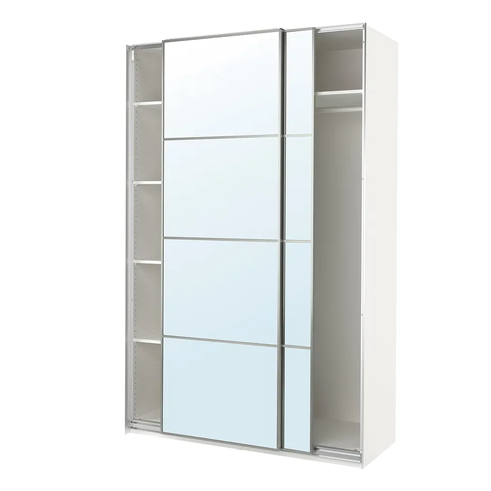 A white PAX wardrobe with mirrored sliding doors. It stands tall and rectangular, featuring a sleek and modern design.