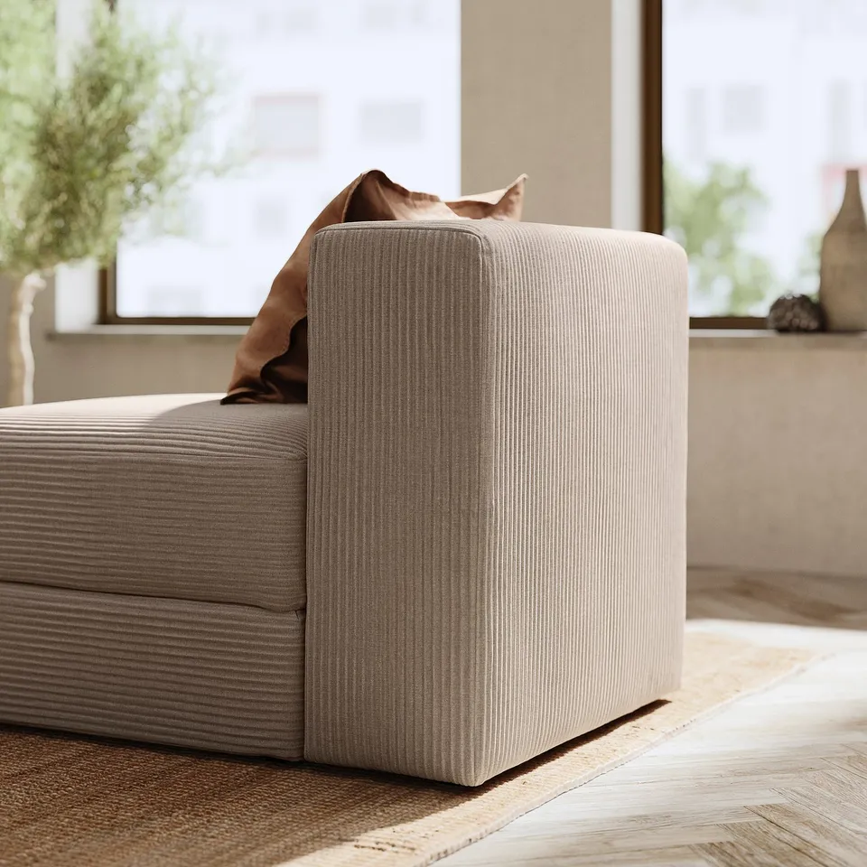 Modern beige JÄTTEBO sofa with removable cover and storage.