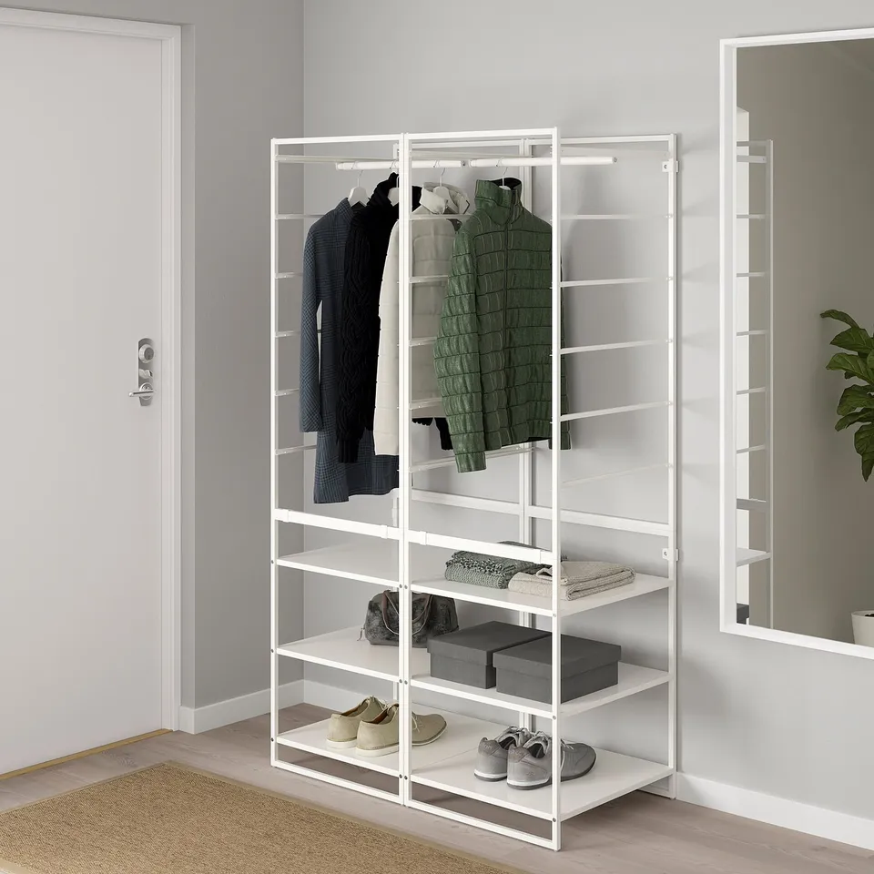 White JONAXEL storage unit with shelves and hanging space, fits corner.