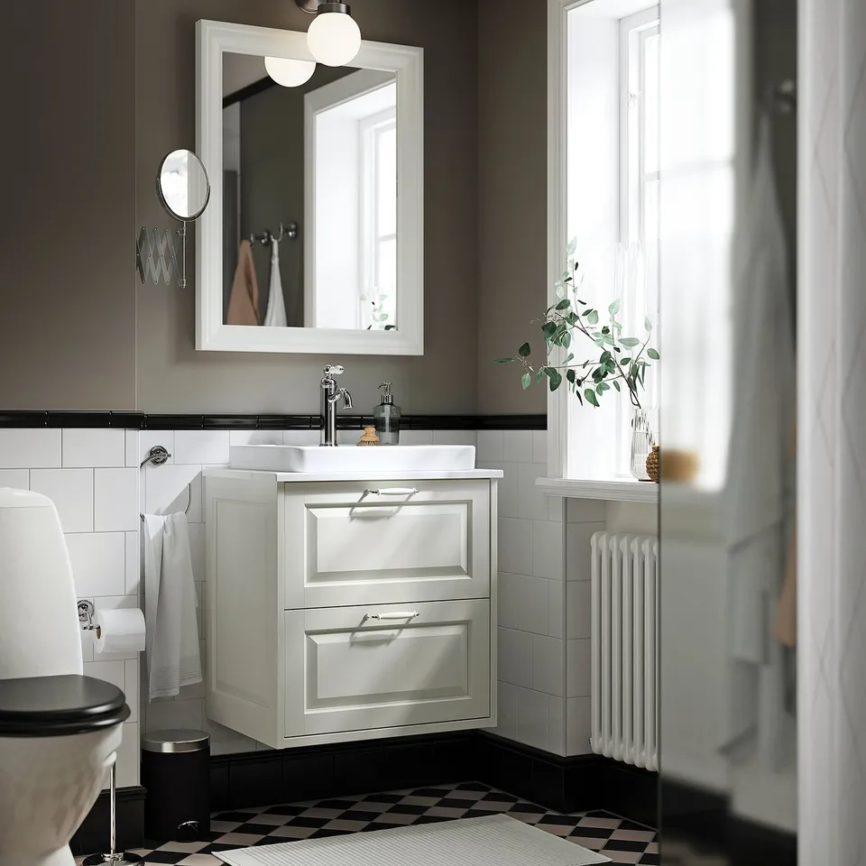 White TÄNNFORSEN vanity with semi-recessed basin and soft edges, larger than a toilet, smaller than a window, includes drawers.