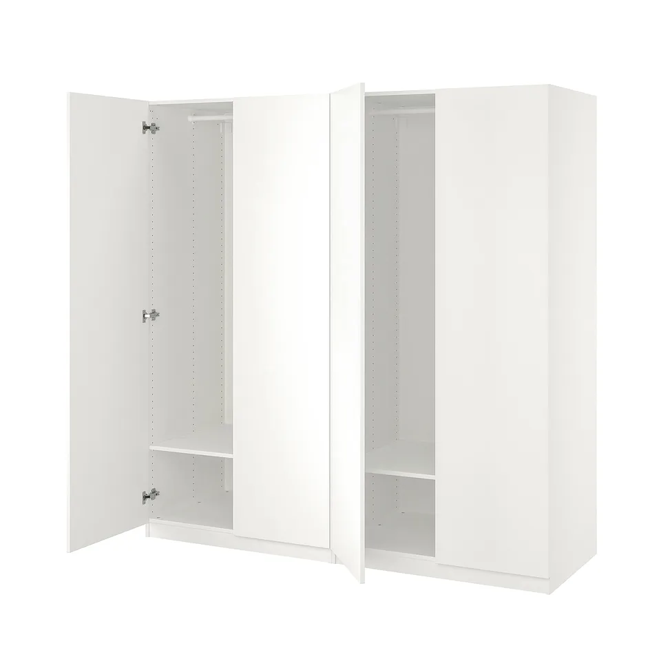 White PAX wardrobe with open doors showing empty shelves and closet space.