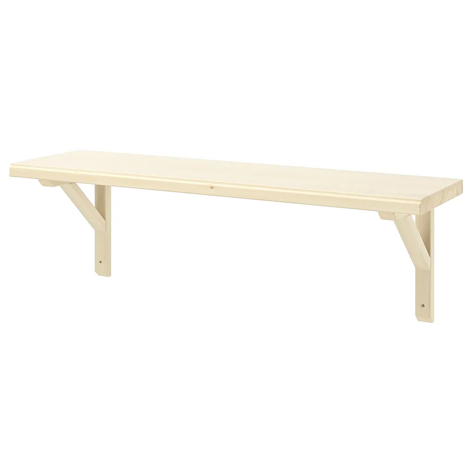 A light-colored, rectangular wooden wall shelf with bevelled and smooth edges, supported by two light-colored wooden brackets.