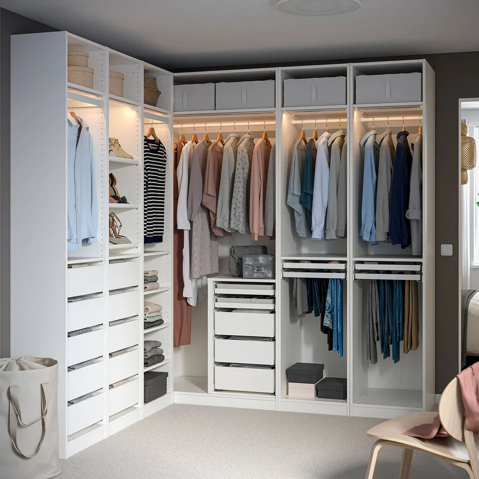 Corner wardrobe with shelves, hanging space, clothes & storage.