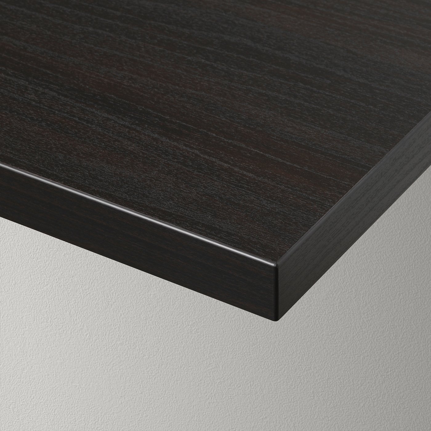 Black wall shelf with smooth edge, showcasing modern design and high-quality material.
