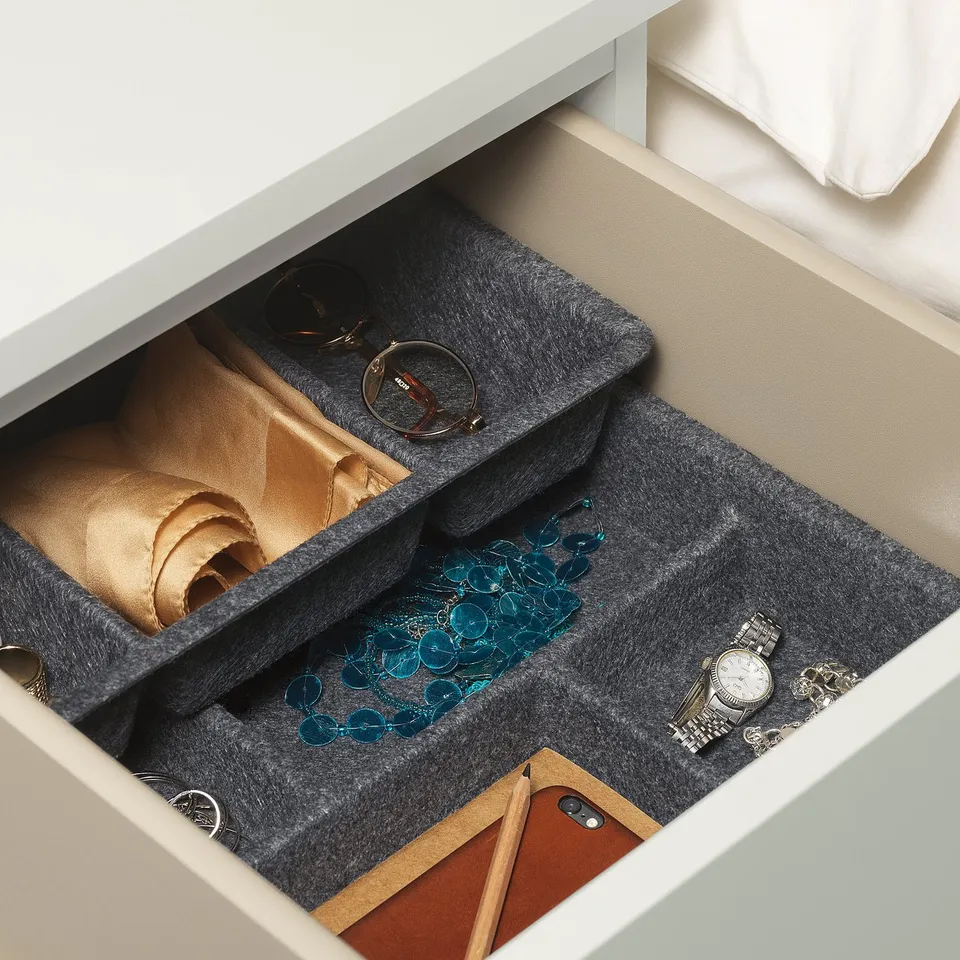 Organised drawer trays for accessories, jewellery, and watches. Stackable design maximises space.