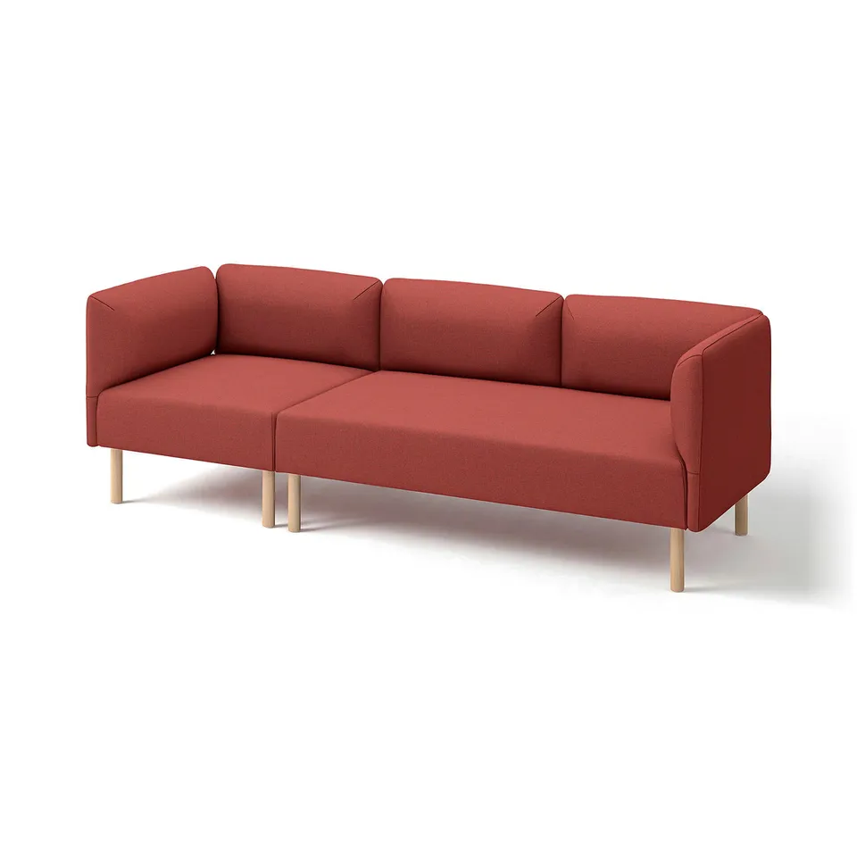A modern red sofa with wooden legs, featuring a minimalist design.