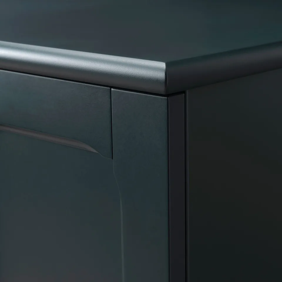 Close-up of sleek, dark storage unit with smooth edges and modern design, showcasing high-quality finish and durable materials.