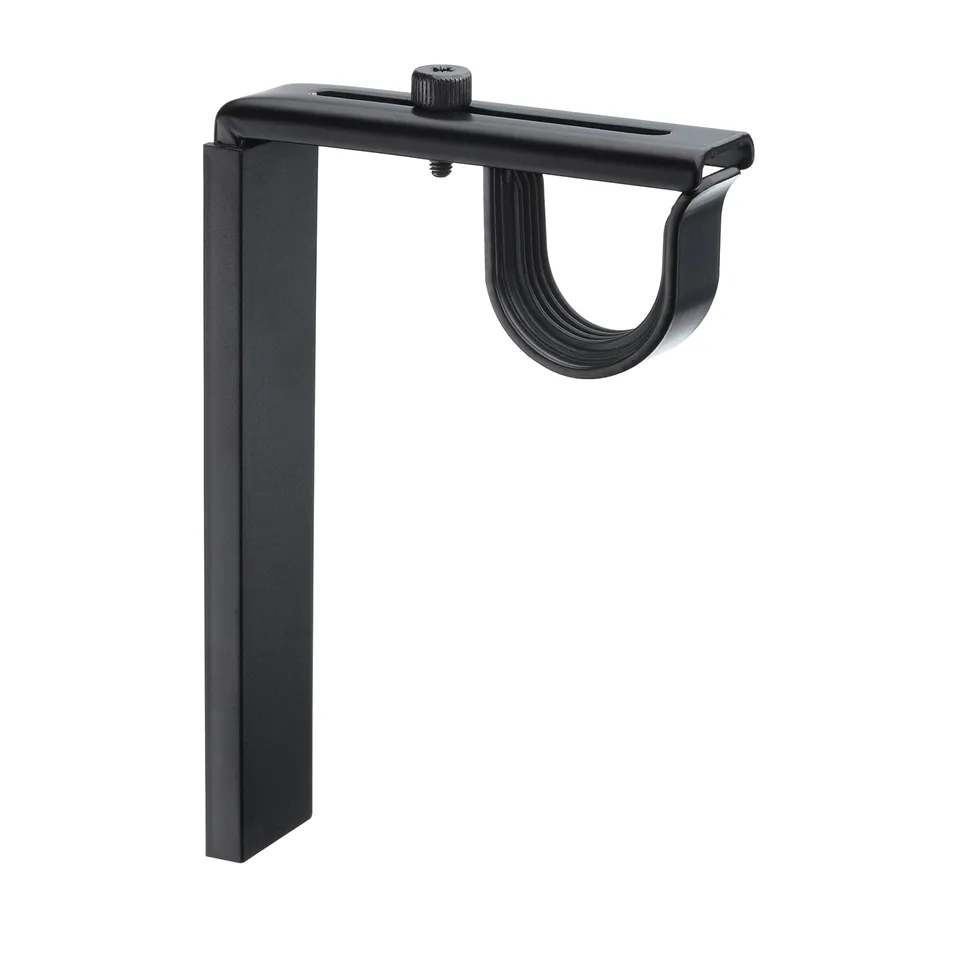 A black BETYDLIG curtain rod holder. Its made of steel and plastic, designed for wall or ceiling mounting.