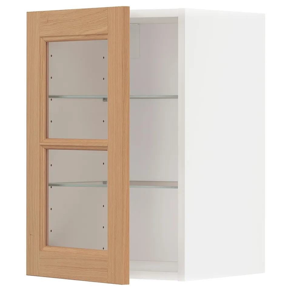 The METOD kitchen cabinet with light oak door and glass shelves. The cabinet has a rectangle shape and minimalist design.