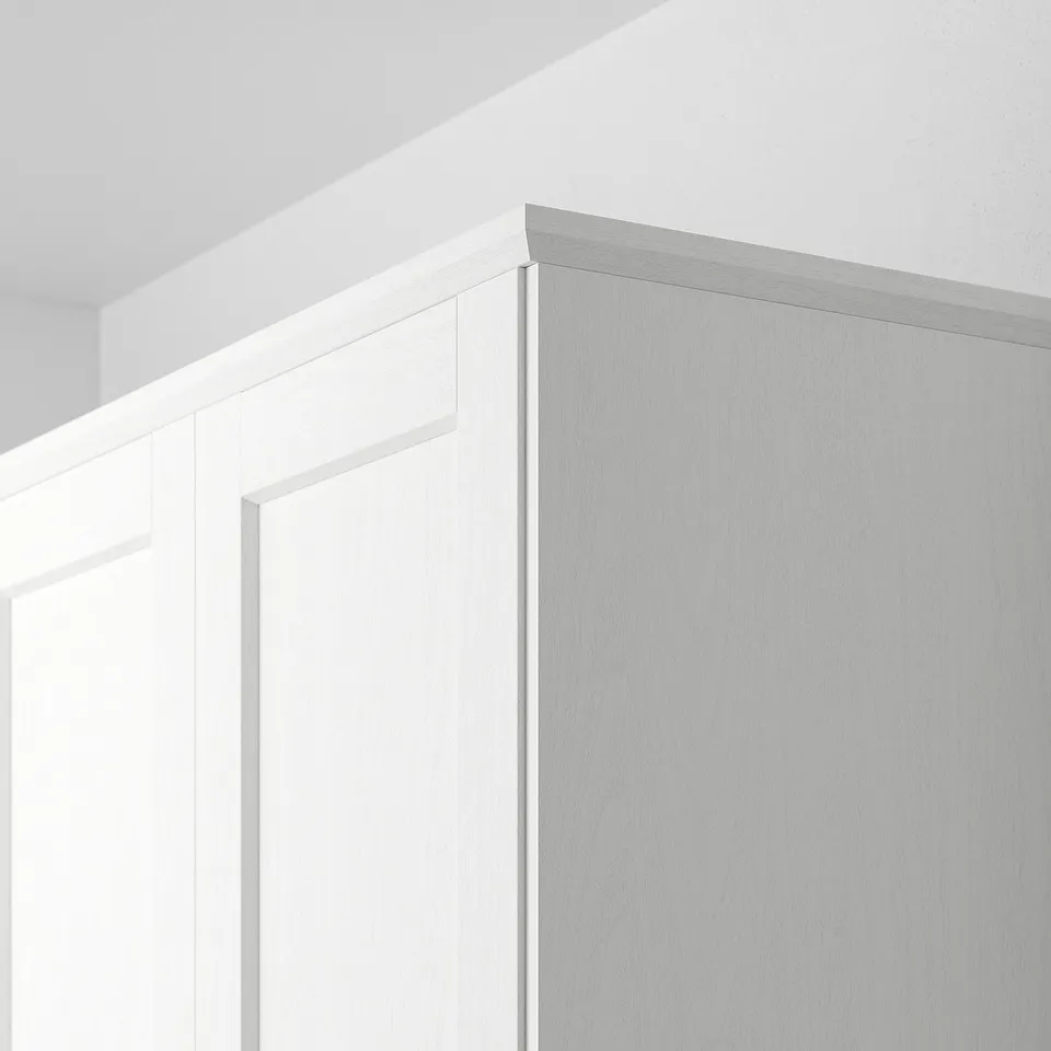 White cabinet edge trim, suitable for kitchen decor, hiding lights or as decorative moulding.
