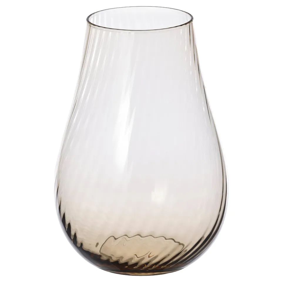 A PÅSKÖTRÄD vase, a drop-shaped glass vase with light-brown swirls inside, reflecting light for a sophisticated look.