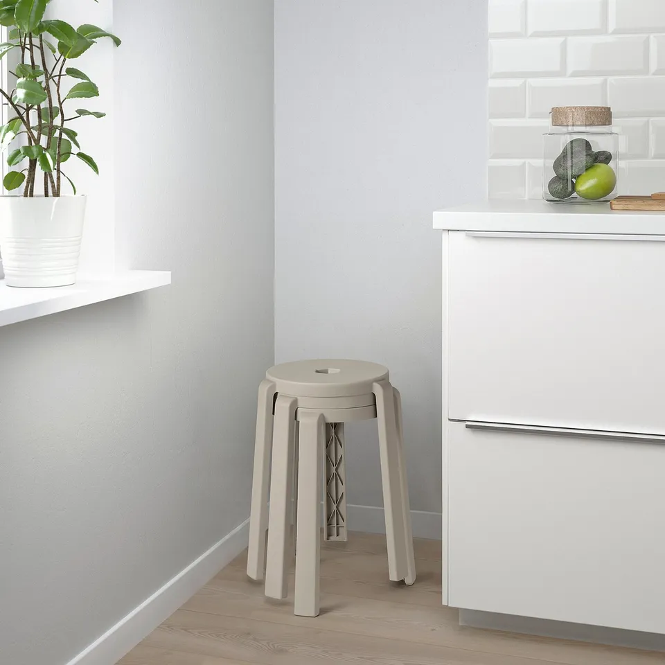 Kitchen stool is stackable and can be used for extra seating or as a side table. Neatly placed in a corner.