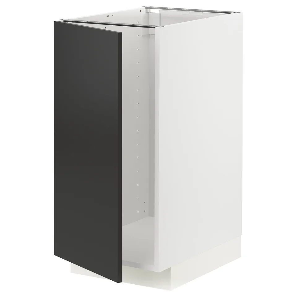 A white METOD kitchen cabinet with a black door. It a modern, sleek design with a sturdy frame.