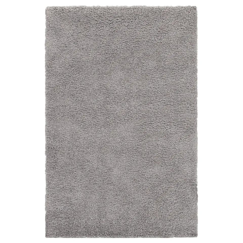 Grey ÄRENDE rug, soft, shaggy, sound-absorbing.
