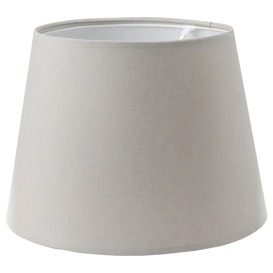 SKOTTORP lamp shade: beige, cylindrical, textured fabric, fits various bases.