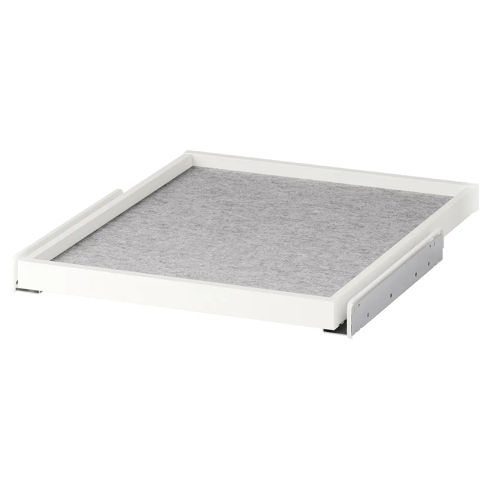 A white KOMPLEMENT pull-out tray with grey felt lining, designed for wardrobe organisation.