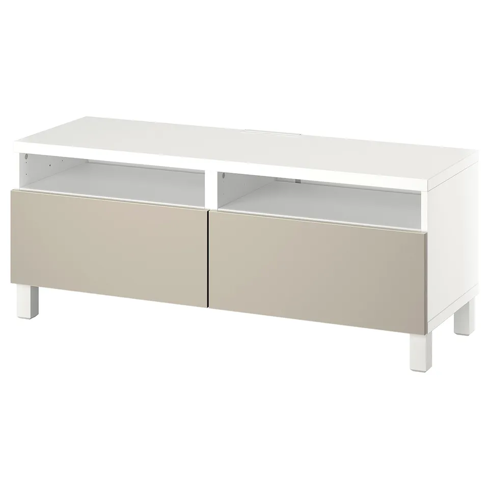 A white and beige BESTÅ tv bench with drawers and open shelves for storage and cable management.