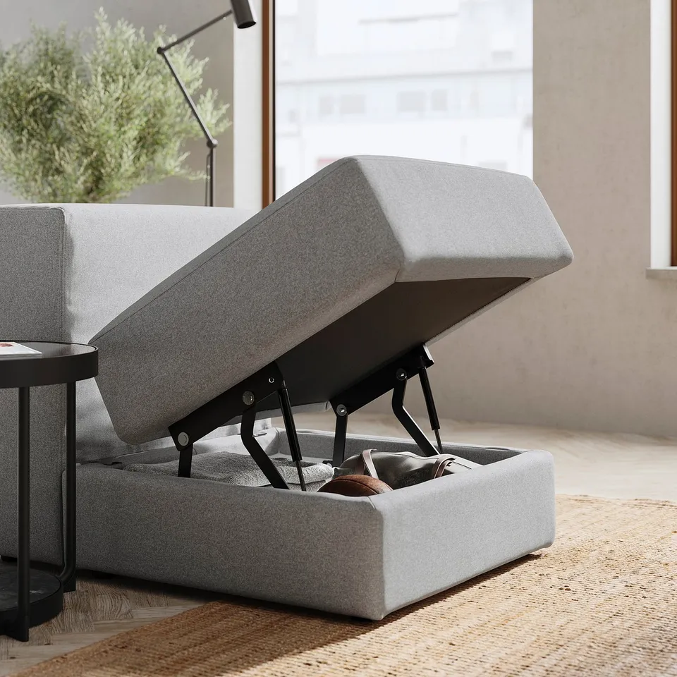JÄTTEBO grey sofa with storage. Modern, light grey, modular design. Open seat reveals hidden compartment.