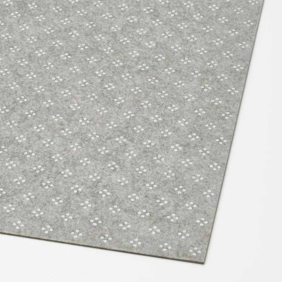 Grey drawer mat with anti-slip dots, cutting lines for custom size.