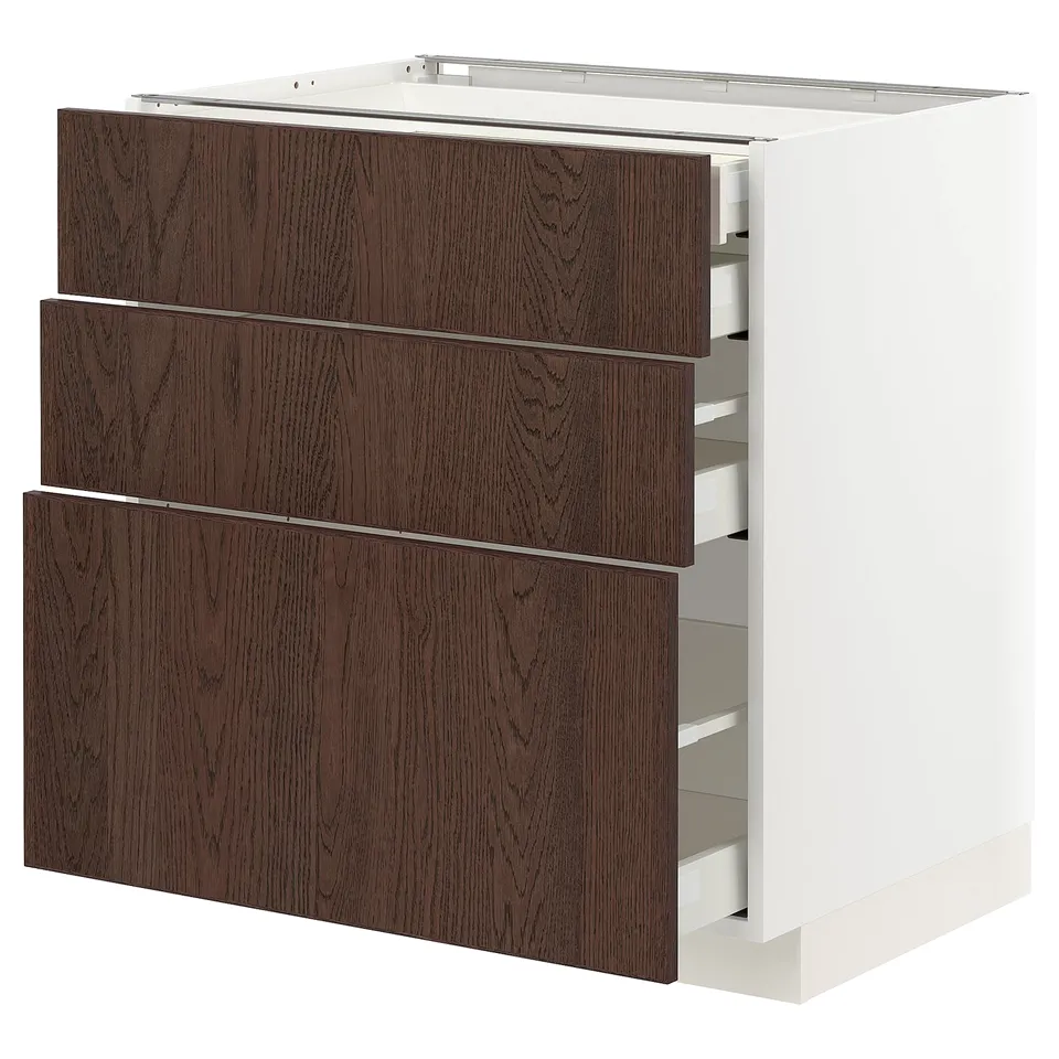 Modern kitchen unit, white and dark wood. Three drawers, minimalist design.