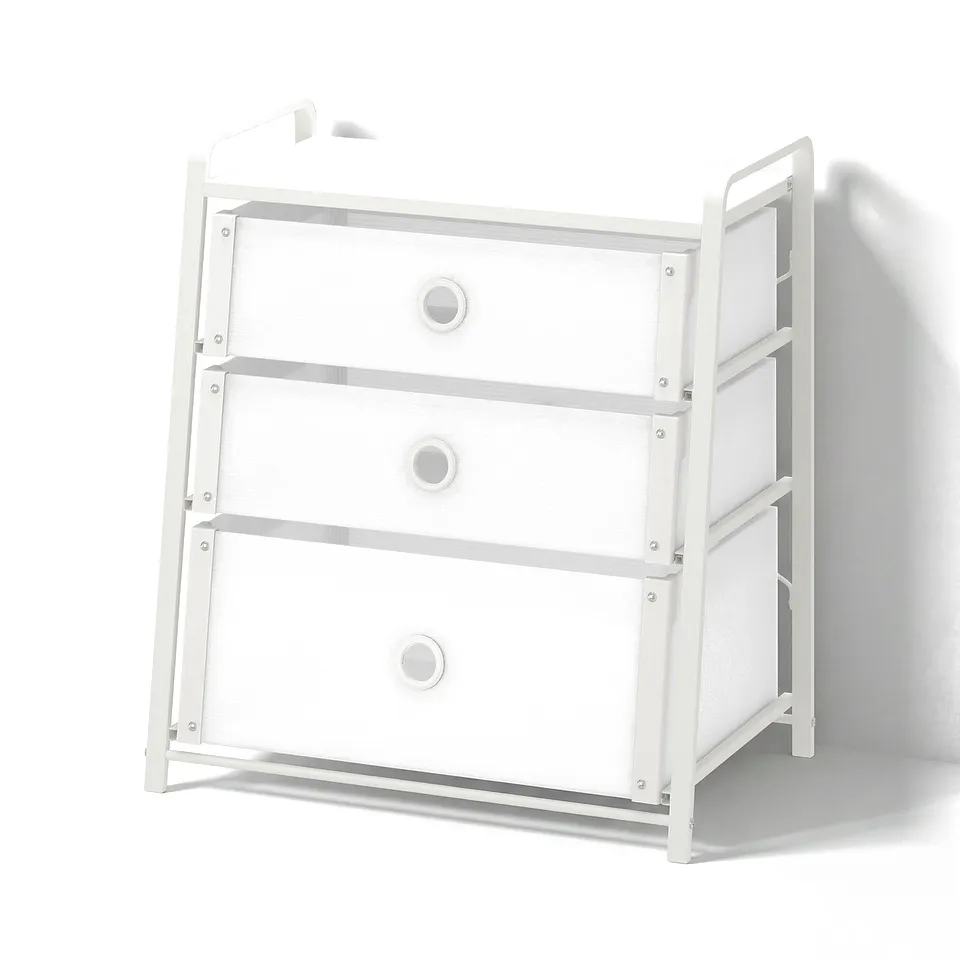 White LOTE chest with three drawers, transparent fronts, metal frame.
