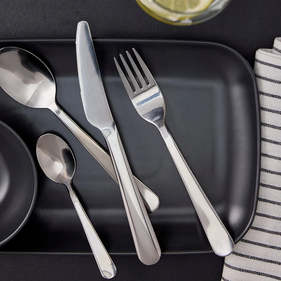 DRAGON stainless cutlery on tray.