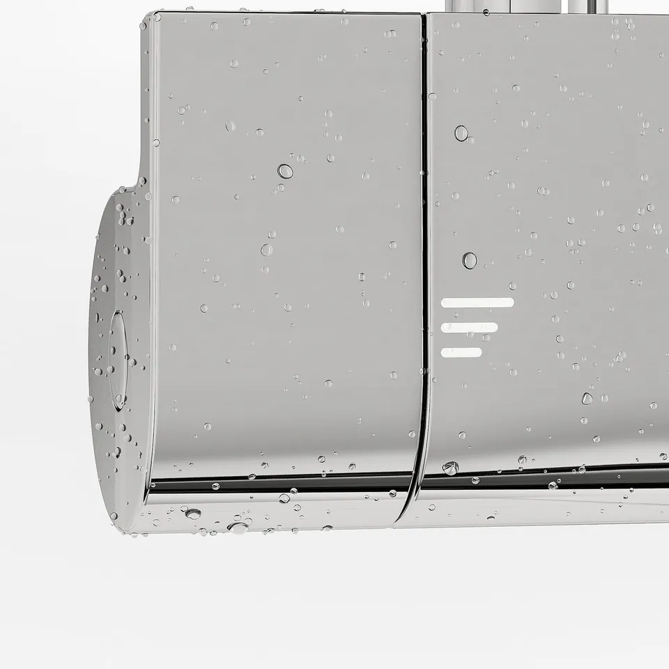 Silver thermostatic shower mixer with water droplets, featuring safety stop and cold touch technology.