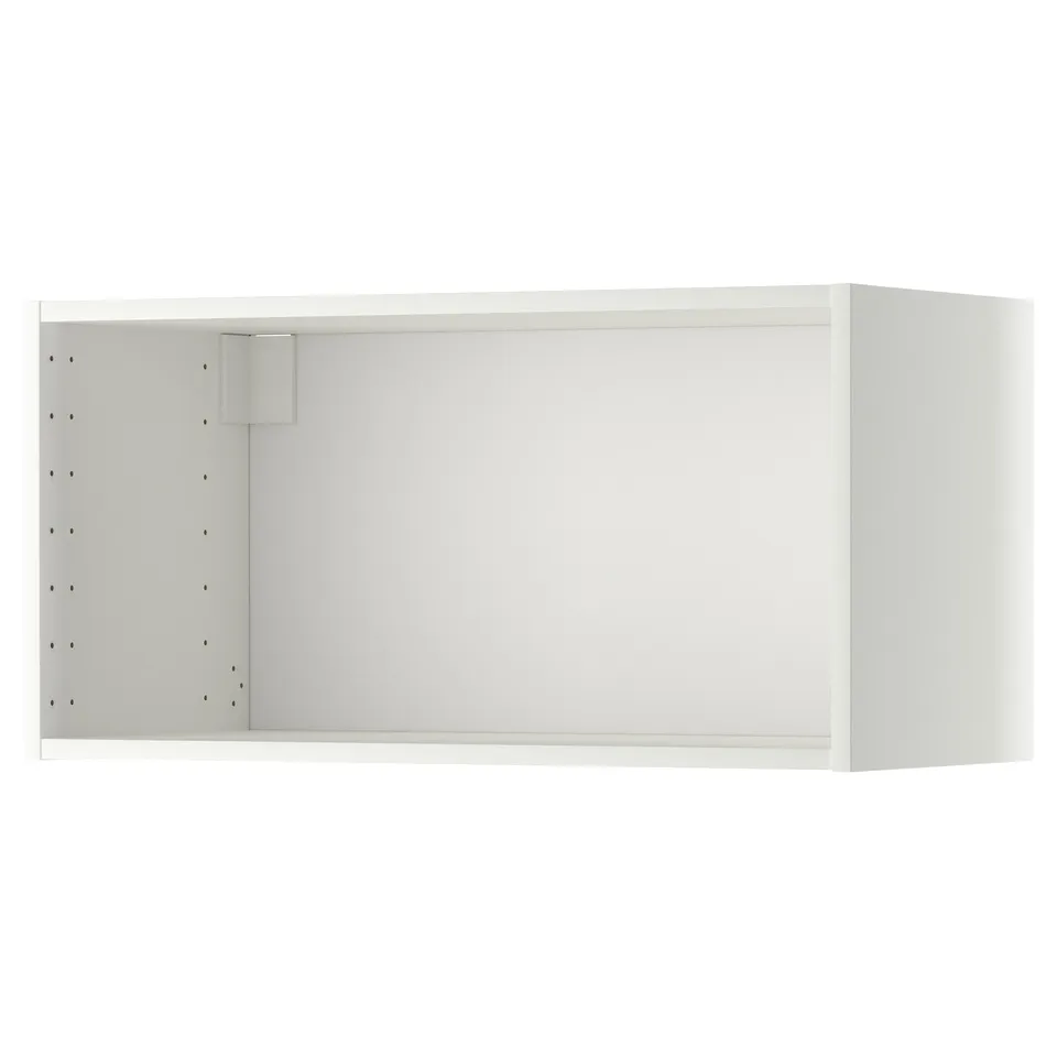 White METOD wall cabinet, modern design with perforated side panel.