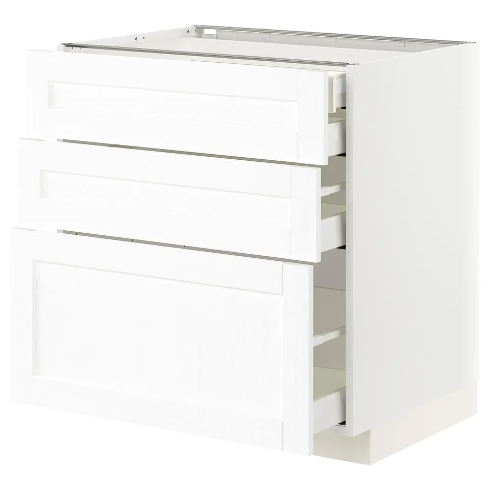 White METOD kitchen cabinet with multiple drawers.