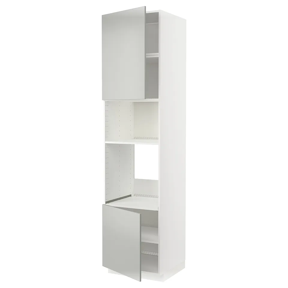 A white METOD kitchen cabinet with open doors, featuring a modern clean design with multiple storage shelves.