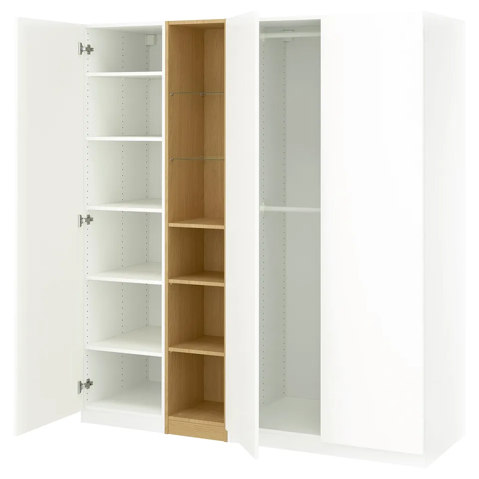 White PAX wardrobe with wooden interior, four wooden shelves, two doors with silver hinges.