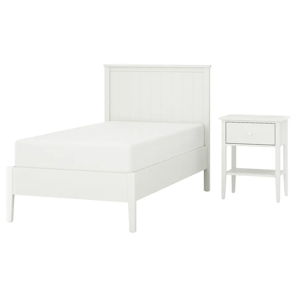 A white GULLABERG bedroom set, including a bed with a simple, wooden headboard and a matching bedside table with one drawer.