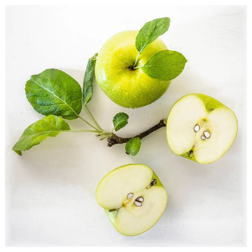 LOTSFÅGEL Scented candle in glass, Apple light green, 20 hr