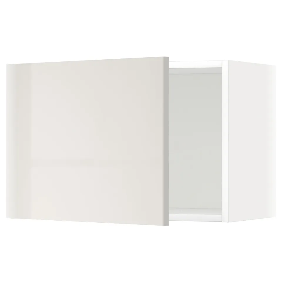 White METOD wall cabinet, sleek design, glossy finish.