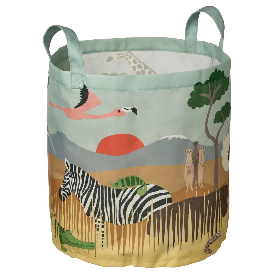 Safari-themed, green storage basket with handles, featuring zebra, crocodile, meerkats, and trees.