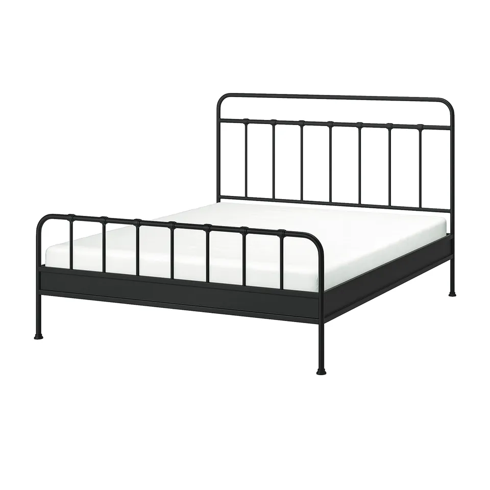 Black metal bed frame, STJÄRNÖ, with curved headboard and footboard.