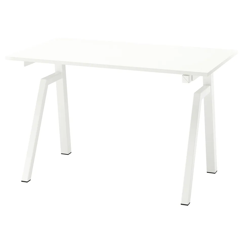A TROTTEN white table with a rectangular top and angled legs, made of melamine and steel.