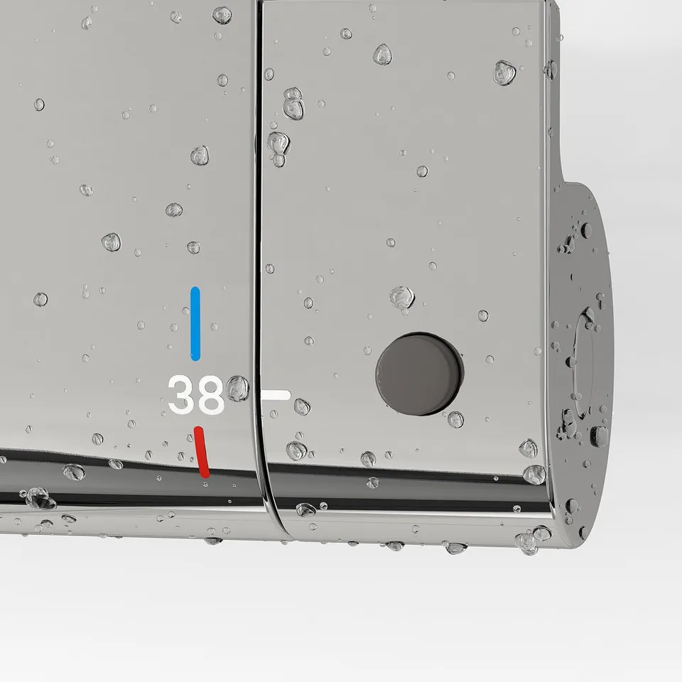 Close-up of a thermostatic shower mixer. Shows 38°c safety stop, cold touch feature, and built-in shelf.